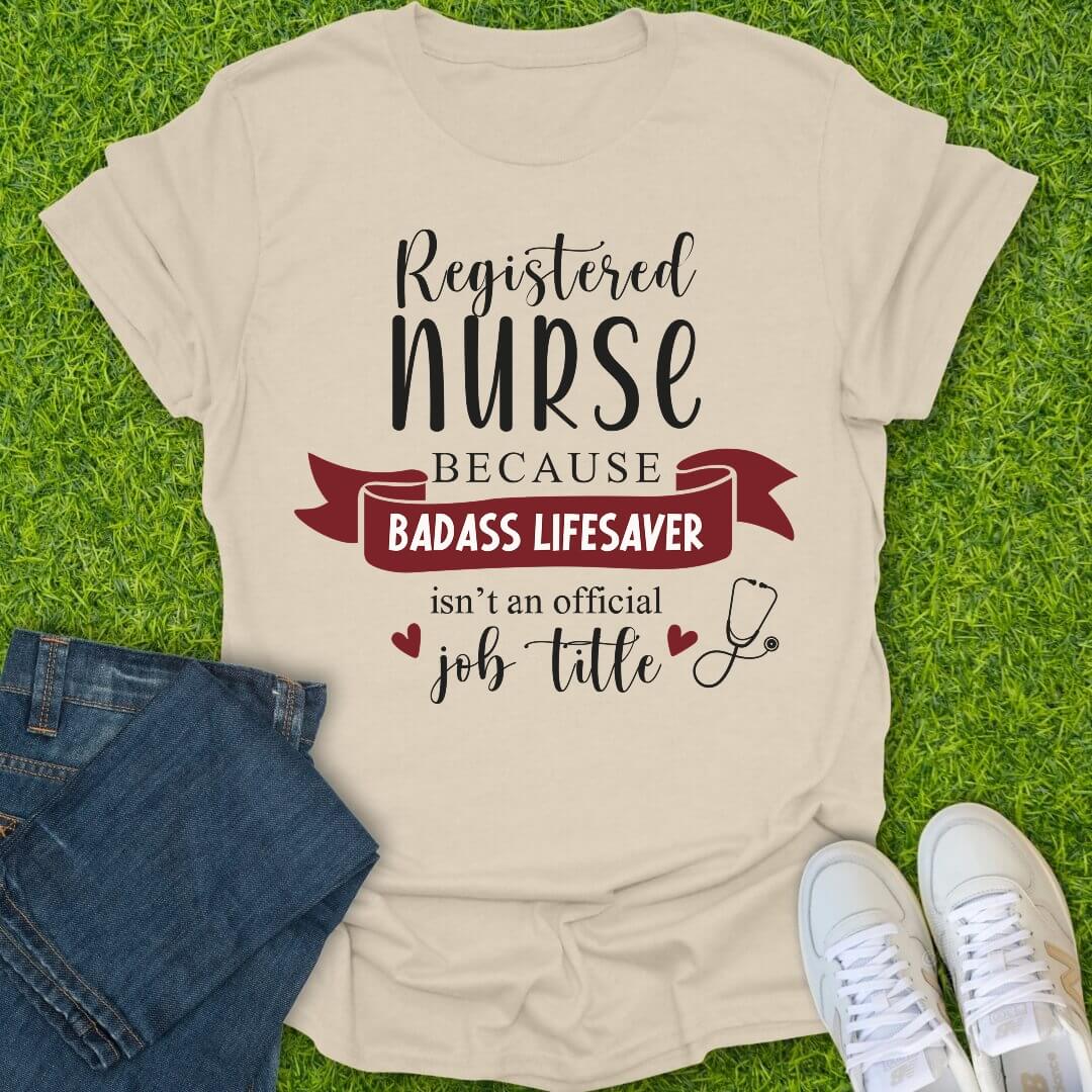 T-Shirt Natural / S Because Badass Isn’t a Title Tee